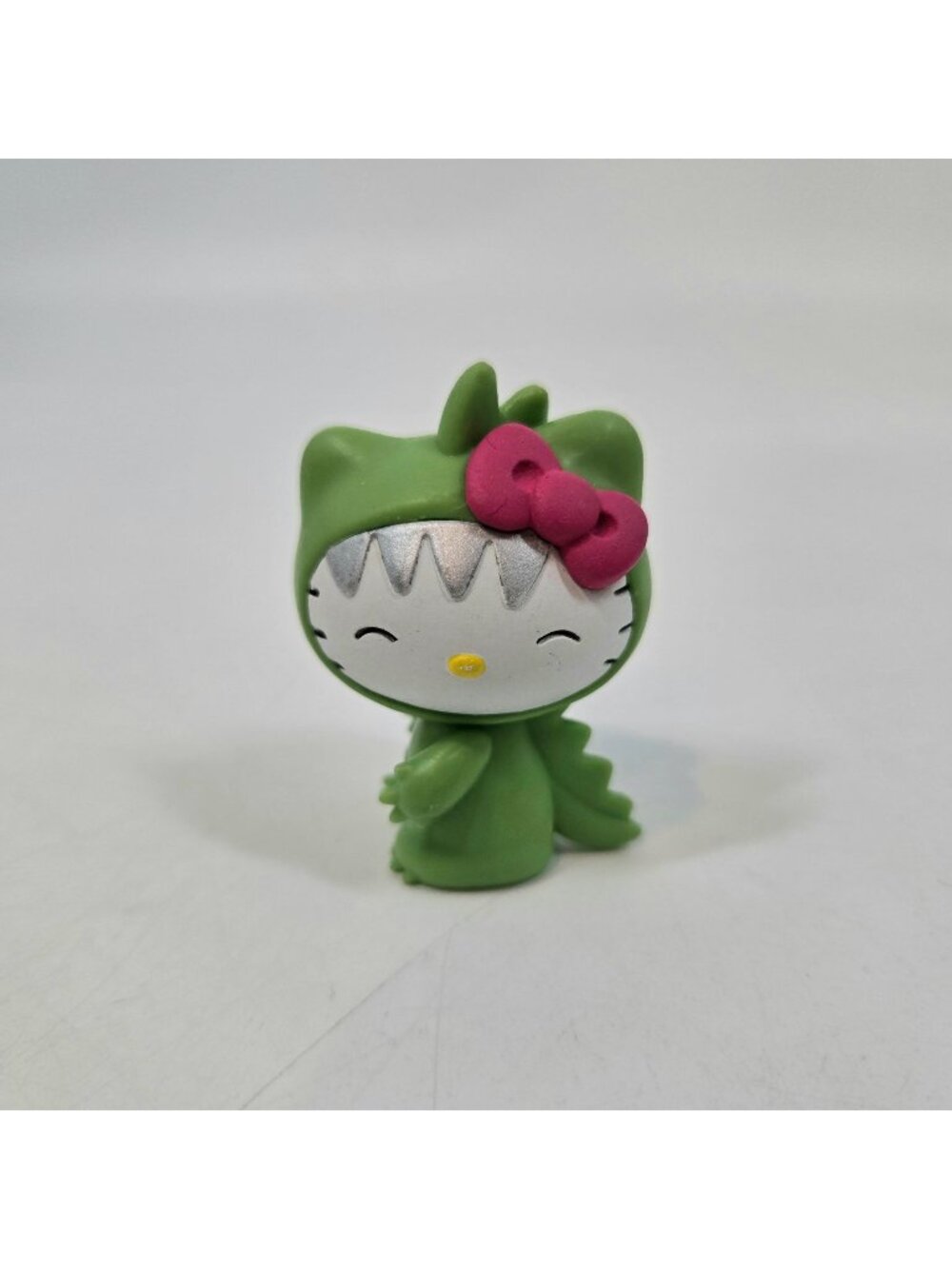 Sanrio Blind Bag Mini Hello Kitty Dinosaur Figure Green Pink Bow Jada Toys 2"